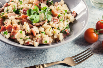 Spaetzle with fried bacon and onion
