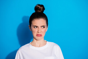 Close-up portrait of her she nice-looking attractive gloomy grumpy sullen irritated girl dislike reaction isolated over bright vivid sine vibrant blue color background