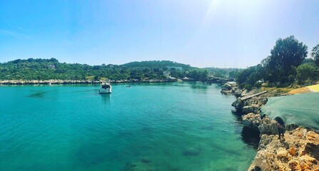 Fototapeta premium Blue sea and a yacht in the Mediterranean sea 