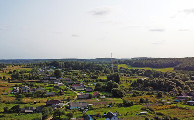 Beautiful top view of a forest landscape with green trees near the suburb