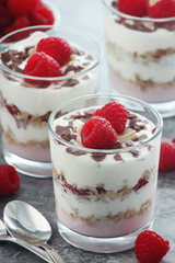 Granola with yogurt trifles with raspberry