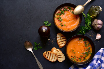 Vegetable soup ( carrot or pumpkin ). Top view with copy space.