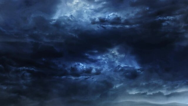 a dark blue cloud moving with a thunderstorm in it