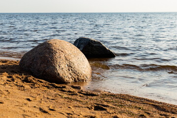 Stones on the shore close up.