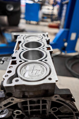 New pistons and cylinder head of engine block vehicle. Motor capital repair. Sixteen valve and four...