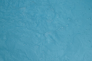 Blue water surface of swimming pool. 