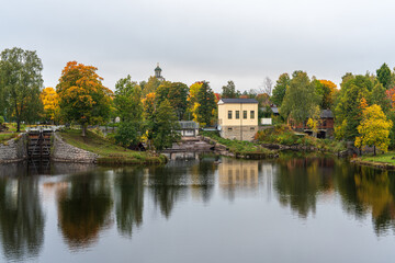 Fototapeta na wymiar Colorful autumn view of the stromsholms canal in Sweden