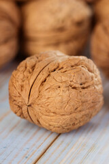 Walnut on a blue table.