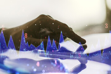 Multi exposure of creative statistics data hologram with finger presses on a digital tablet on background, stats and analytics concept