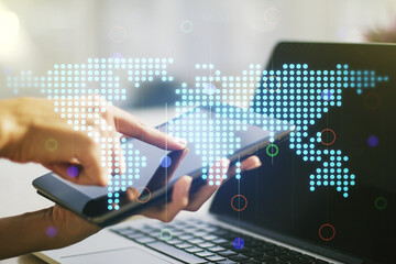Multi exposure of abstract graphic world map and hand working with a digital tablet on background, big data and networking concept