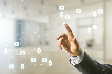 Man hand clicks on abstract virtual medical hologram on blurred office background, online medical...
