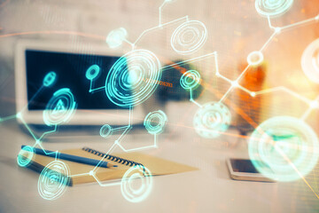 Computer on desktop with social network hologram. Multi exposure. Concept of international people connections.