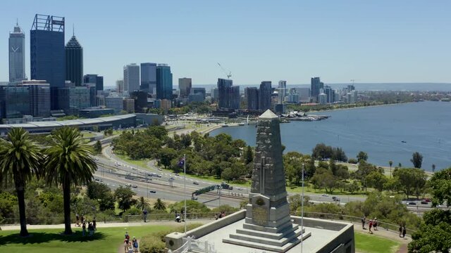 drone going up and over war monument in perth australia and timewarp to coastline in the bay