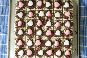 Black forest cake with pink love topping
