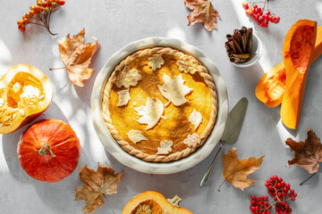 Sunny autumn day pumpkin pie baking at home concept