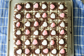 Black forest cake with pink love topping