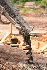 Lay of the cement or concrete into the foundation formwork with automatic pump