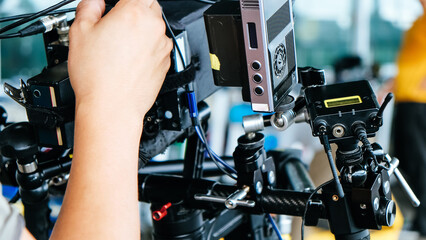 Naklejka na ściany i meble Film industry. Image of professional camera and equipment background