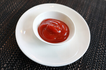 Ketchup in white plate