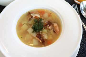 Smoked fish soup with trout and pike perch
