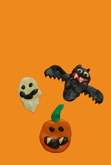 Children's crafts made of plasticine. Halloween. Bat, Ghost and pumpkin