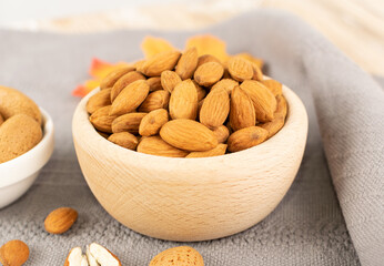 Heap of Raw Almonds on Rustic Background Closeup