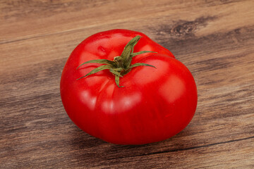 Ripe tasty red big tomato