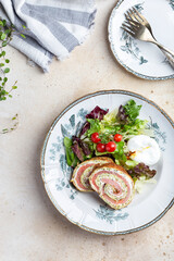 delicious breakfast with zucchini smoked salmon roulade