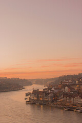Naklejka na ściany i meble Sunset in the city of Oporto with river