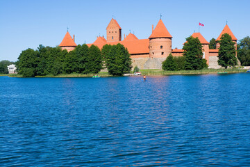 Gothic style red brick castle on an island on Galve Lake, Trakai, Lithuania