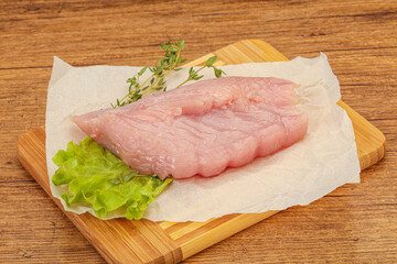 Raw turkey breast steak for cooking