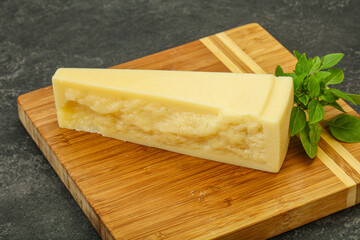 Hard parmesan cheese served basil