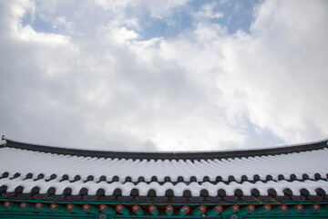 Korean temple roof covered in snow
