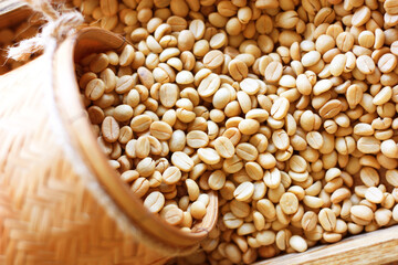Parchment coffee in bamboo basket