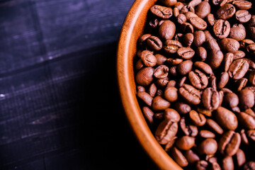 Fototapeta premium Roasted coffee beans background. Top view. Copy space