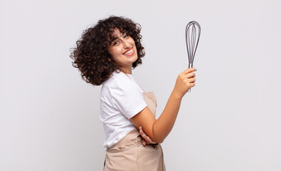 arab pretty woman chef wearing an apron.