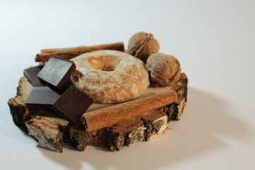 Coffee beans, cinnamon, round gingerbread, chocolate