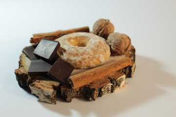 Coffee beans, cinnamon, round gingerbread, chocolate