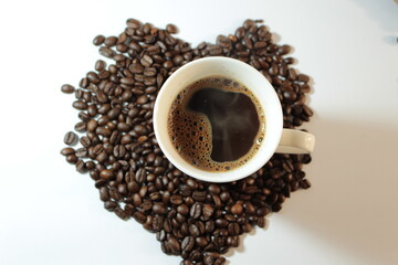 Coffee and coffee beans. Cup of coffee. Coffee mug