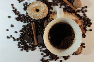 Coffee, Coffee beans, cinnamon, round gingerbread, chocolate