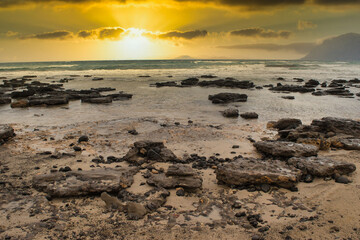 Beautiful sunset on the beach on the island of lanzarote, canary islands