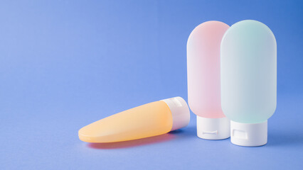 essential things to pack for travelling. essential travel kit. toiletry kit. small cosmetic travel containers.