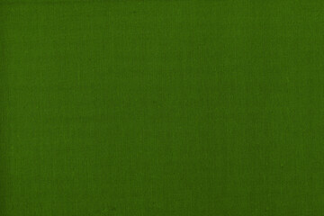 Vintage and old looking paper background. Colored green retro book cover. Ancient book page.