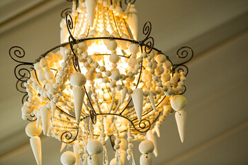 Suspended chandelier as interior decor at corporate gala dinner