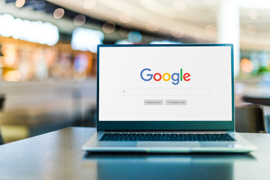 Laptop computer displaying logo of Google