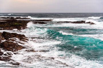 Scenic view of sea with rocky beach against sky. Fuerteventura, Canary Islands, Spain