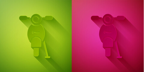 Paper cut Scooter icon isolated on green and pink background. Paper art style. Vector.
