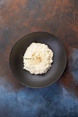 traditional Italian risotto in a dark plate