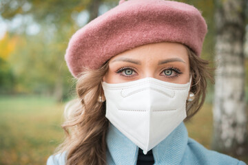 elegant girl in protective mask