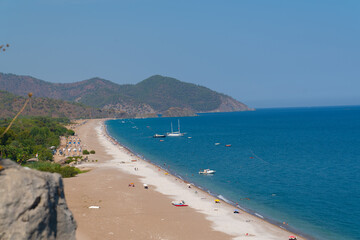 Olimpos, Antalya/Turkey-September 24 2020: People enjoy sea and sand in summer just near ancient city.